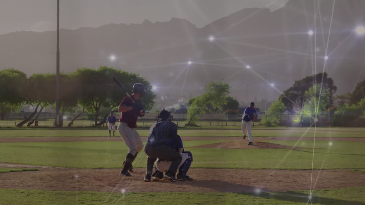 Digital network connections overlaying baseball game in progress at school field