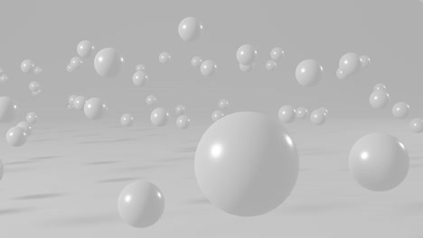 white balls flying on a white background. simple motion graphic seamless loop animation