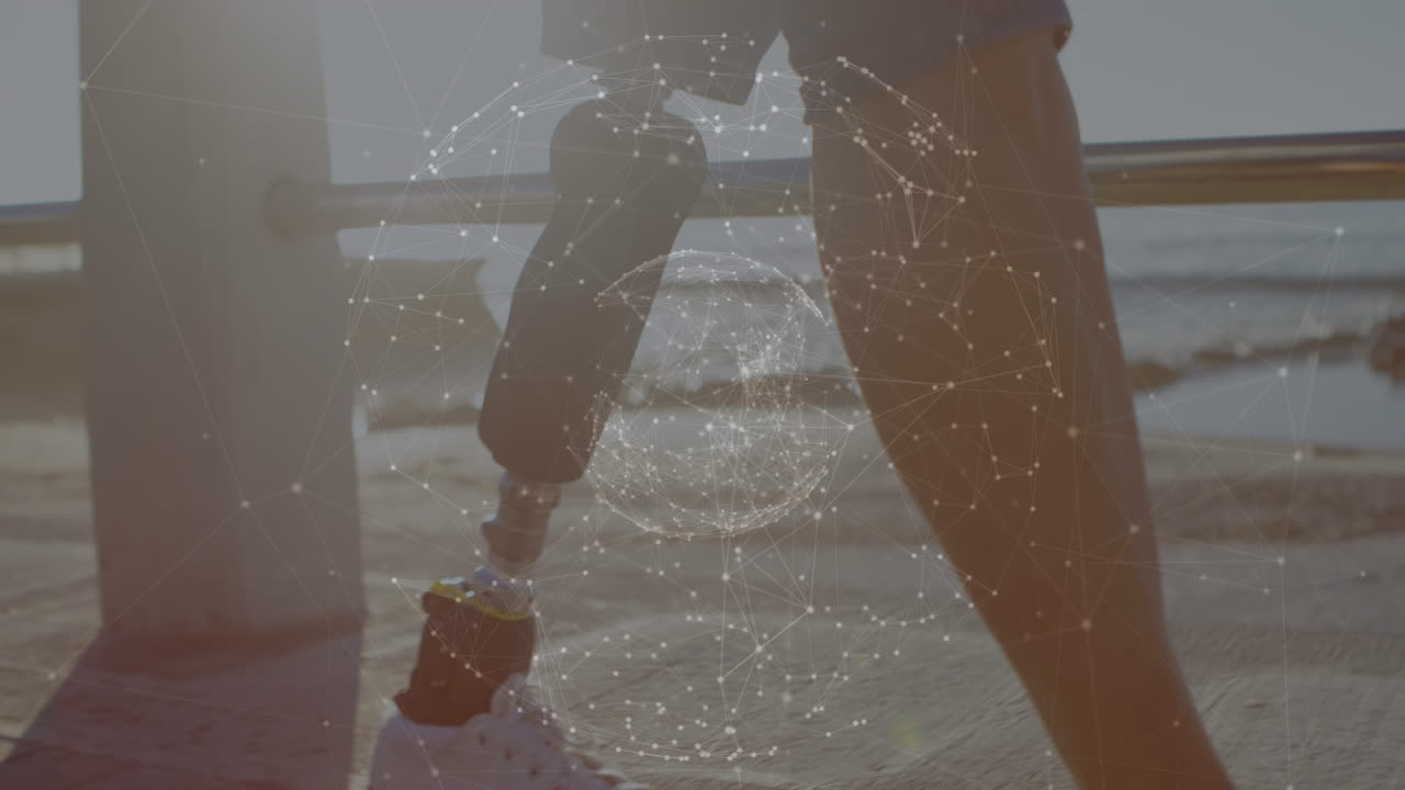 Animation of globe rotating over caucasian woman with prosthetic leg holding coffee and using phone