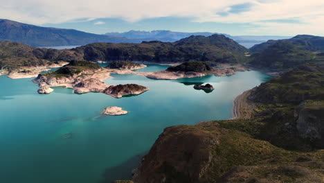 Lake-General-Carrera-in-Patagonia-from-chile,-with-water-shinny-like-a-mirror-with-the-reflexion-of-the-clouds