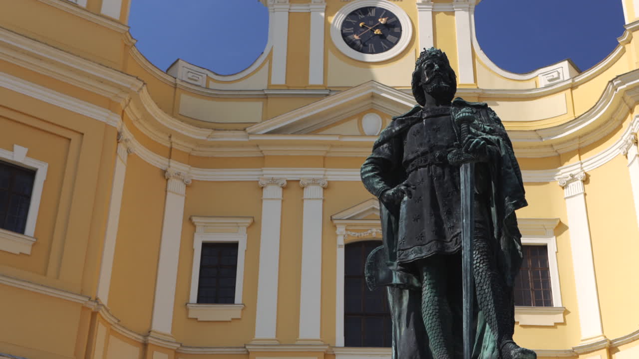 Statue Of Saint Ladislaus Outside Roman Catholic Basilica In Oradea, Romania. low angle, parallax effect