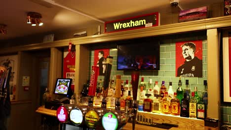 bartender serving drinks at a wrexham pub