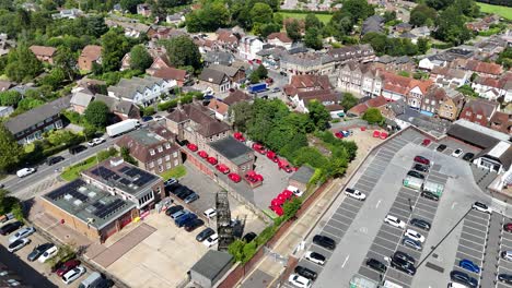 red vans parked post office yard crowborough town in kent uk drone,aerial