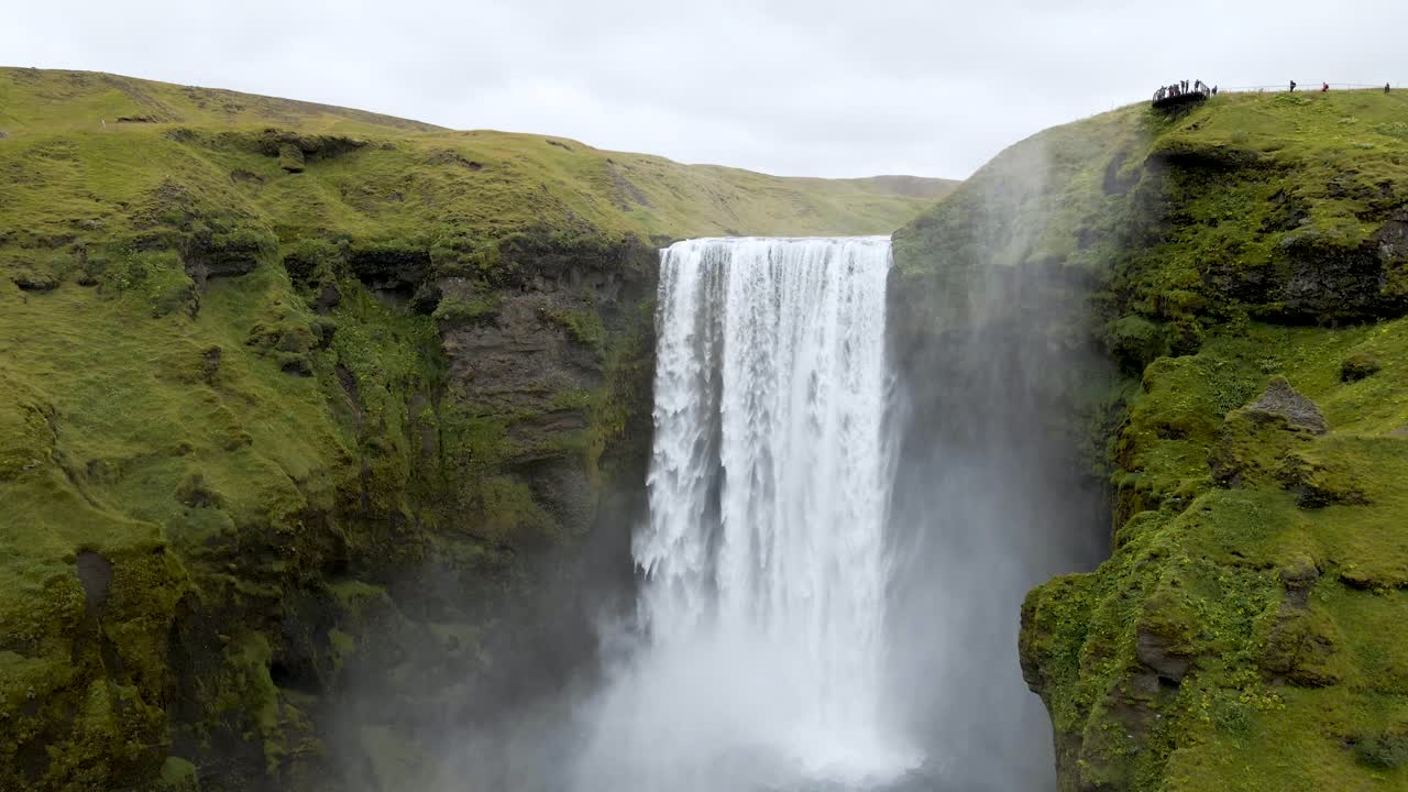 Experience Sk&oacute;gafoss Waterfall from above with our 4K drone footage, highlighting Iceland's epic scenery