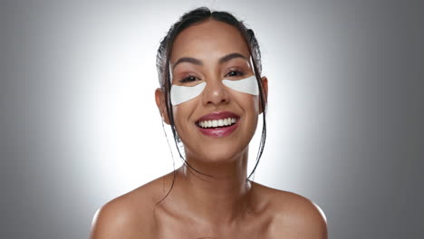 Face,-eye-patches-and-woman-with-skincare