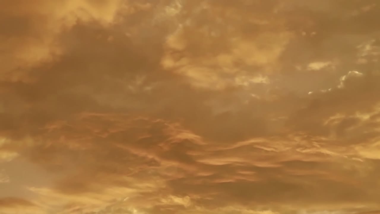 Golden yellow cloud n sunrise or sunset cloudscape on evening sky