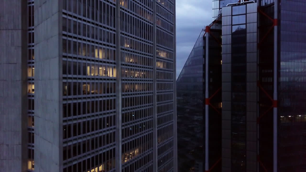 Aerial pull up shot of two skyscrapers in Bogota