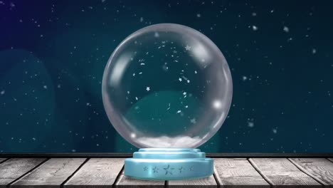 animation of christmas snow globe with snow falling and blue spotlights in background