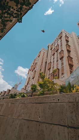 the makkah towers towering near masjid al haram in makkah, saudi arabia.