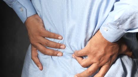 hombre con dolor de espalda