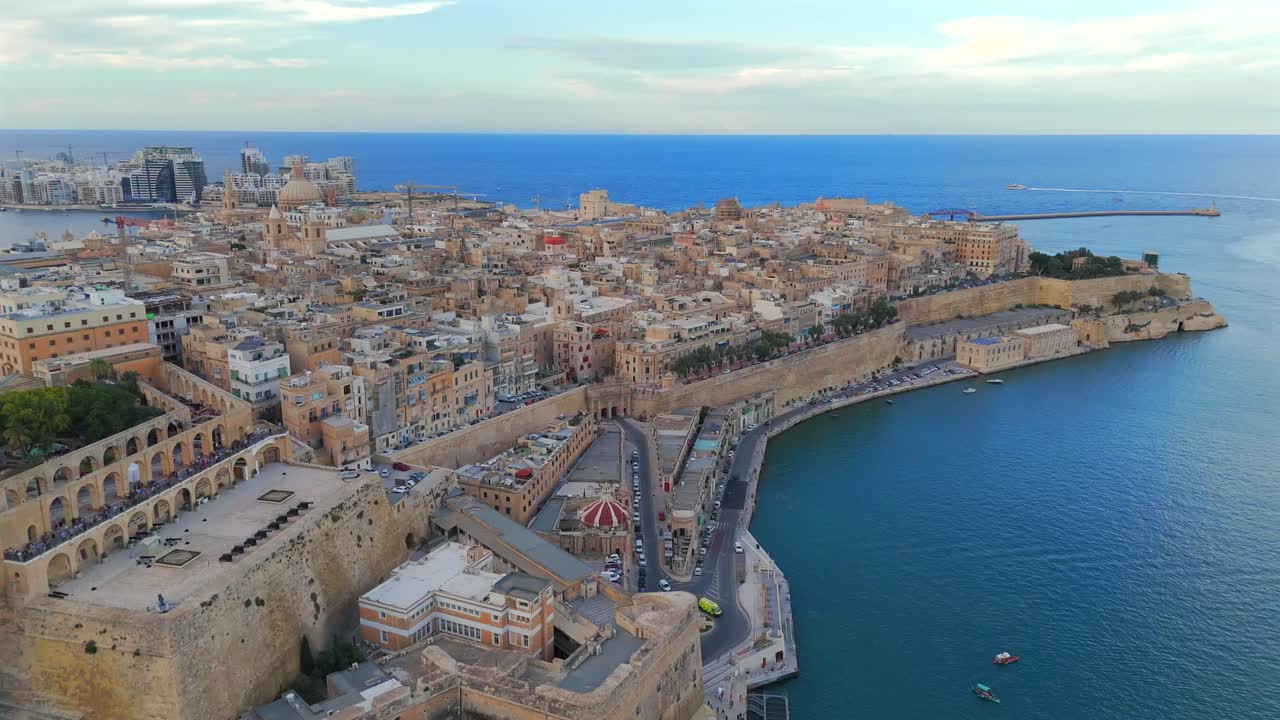 Valletta’s rich history comes to life as the drone glides above its fortresses, palaces, and bustling waterfront.