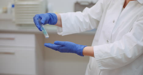 Portrait-Of-Female-Scientist-With-A-Pipette-Analyzes-A-Liquid-To-Extract-The-Dna-In-Lab-7