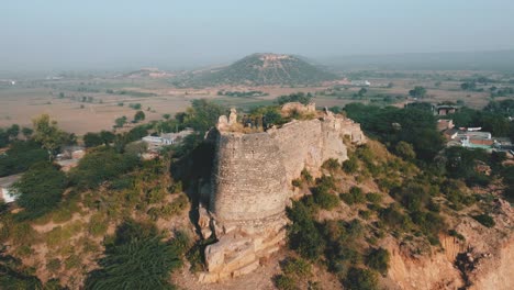 aerial drone view of an abnadoned and ruined jat fort in gwalior , madhya pradesh