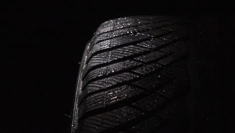 car tire in water droplets. loop