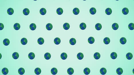 animation of multiple falling globes on green background