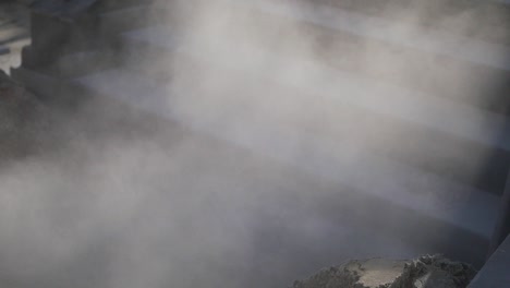 close-up of dust and fog on a concrete construction site