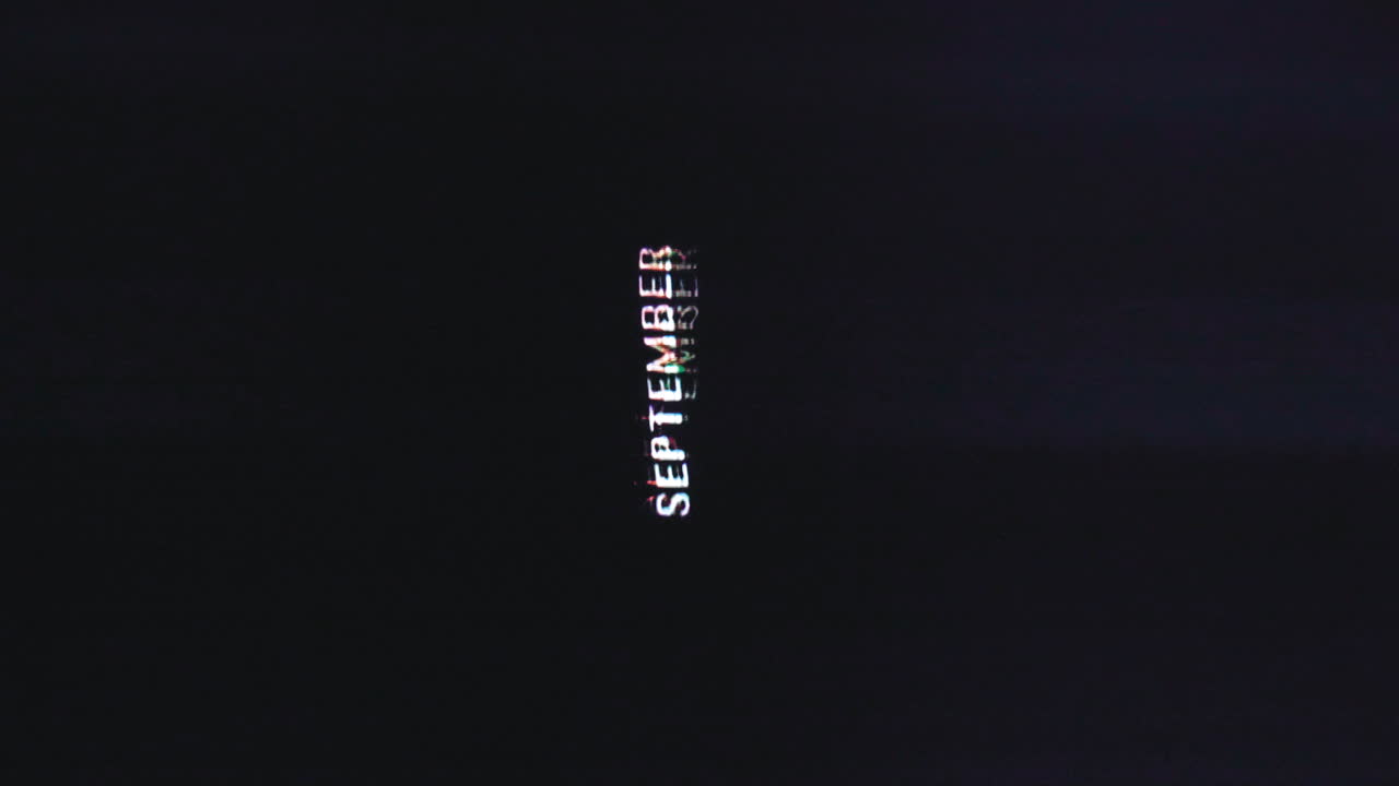 Vertical word for September month glitching out and spreading in trendy hip font