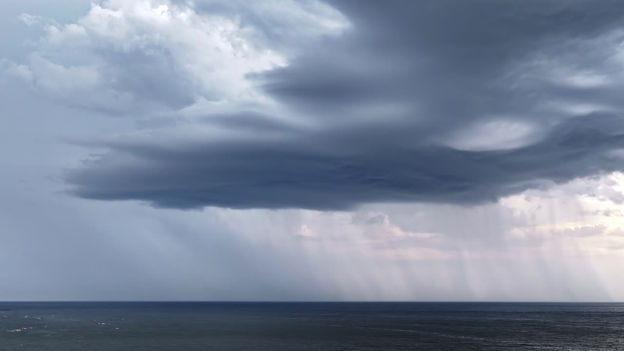Stormy Gray Clouds Over The Sea. Timelapse