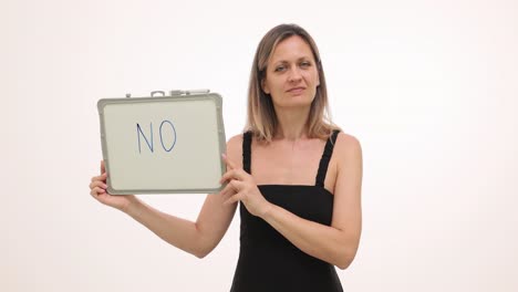 woman holding 'no' sign on white background