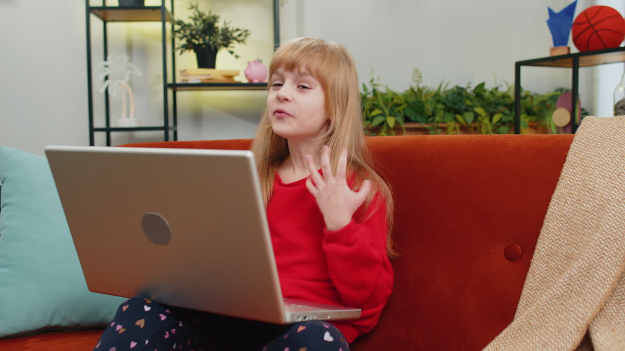 Amazed teen girl use laptop computer receive good news message shocked by victory celebrate win