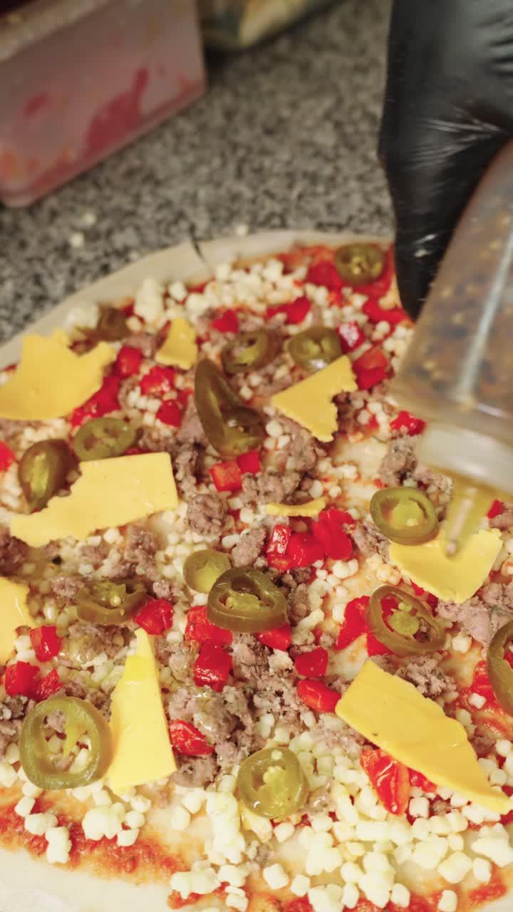 Pizza with Jalapenos, Cheese, and Meat