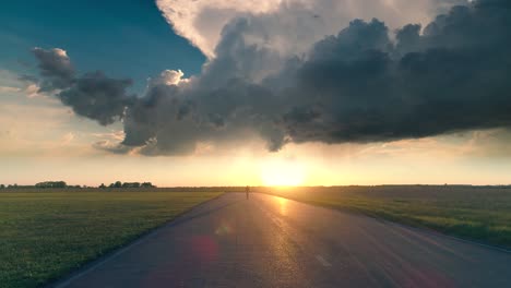 the man walking along the runway on the bright sunshine background