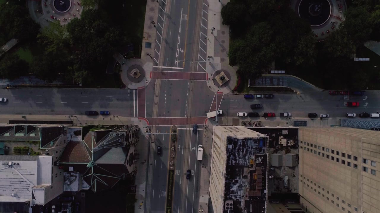 Aerial Top-Down View of a City Intersection with Light Traffic