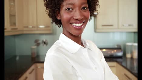 Happy-woman-in-her-kitchen