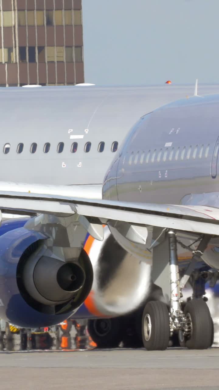 Close-up of an airplane engine and landing gear