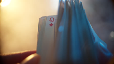 close-up of playing cards being held