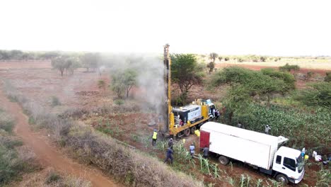 machine drilling water borehole in masai village in loitokitok, kenya