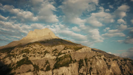 mountain peak under a cloudy sky