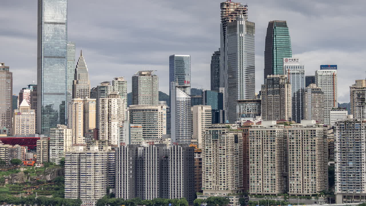 Timelapse of the amazing Chongqing cyberpunk city skyline reflected in a pool at night