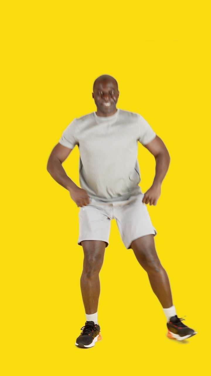 A strong african man doing quaterback exercises
