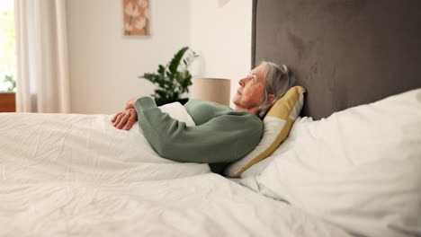 senior, woman and tired for thinking in bedroom