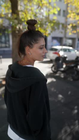 young woman outdoors in city