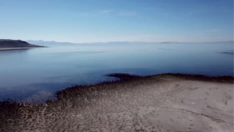 black stones throughout the great salt lake