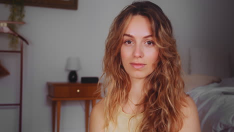 Close-up-gimbal-shot-of-woman-serene-face-in-her-bedroom