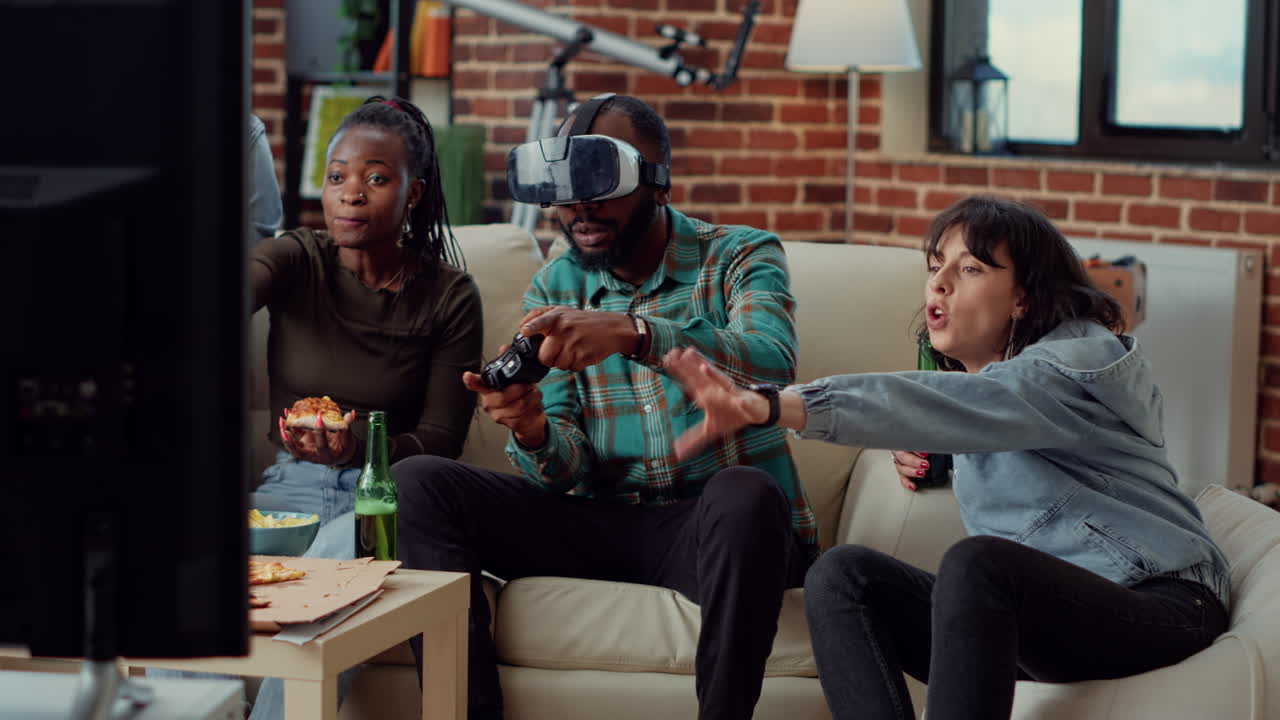 Multiethnic group of people losing video games