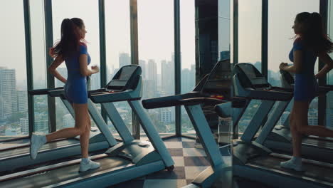 Woman Running on Treadmill in Modern Gym with City View