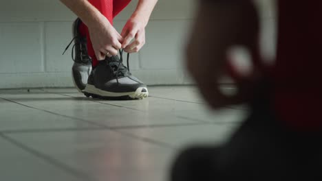 hockey players putting on their equipment