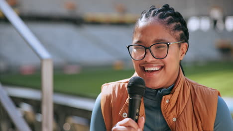 young woman interview at a stadium