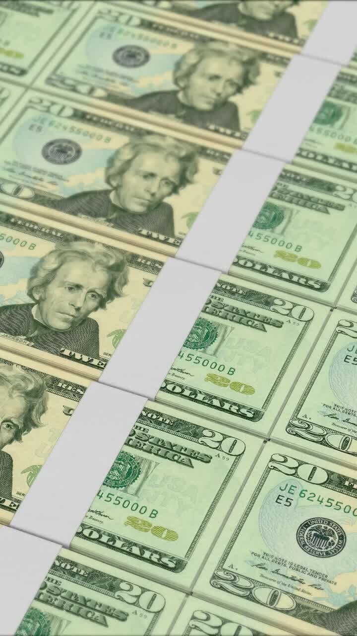 video vertical de billetes de 20 dólares impresos por una prensa de dinero