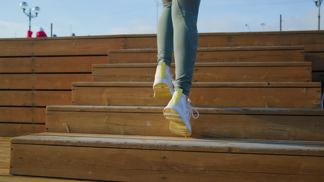 Woman Running Up Wooden Stairs