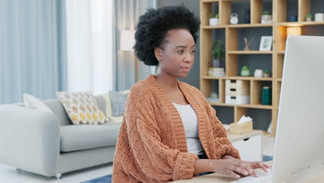 Young-woman-working-remotely-on-a-computer