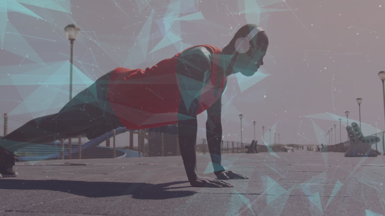 해변에서 운동하는 아프리카계 미국인 남성 위에 움직이는 모양의 애니메이션