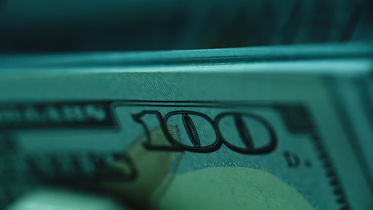 Dollar bills calculating electronic counter closeup indoors. Calculation money