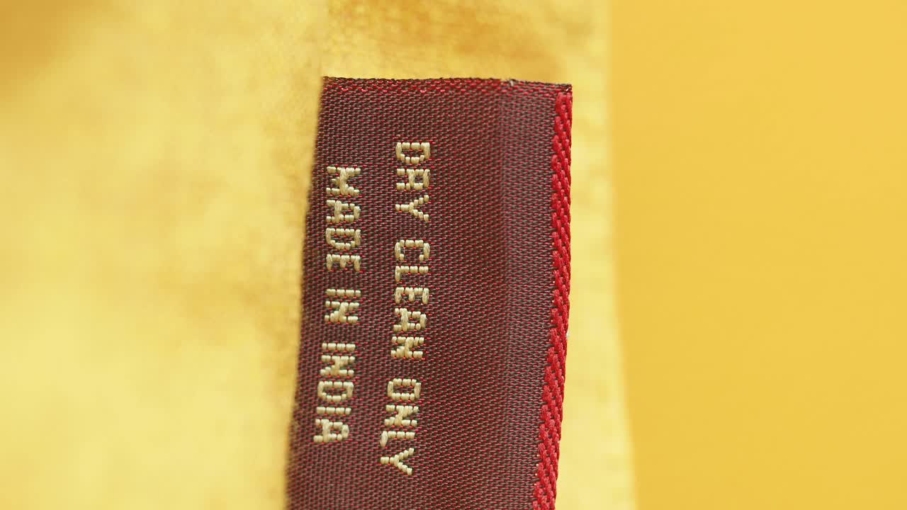 Dry Clean Only Label on a Yellow Fabric