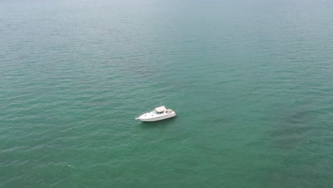 small sailboat at sea - floating