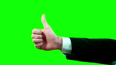 pantalla verde gestos de la mano pulgares arriba y abajo en el juego de imágenes de video.